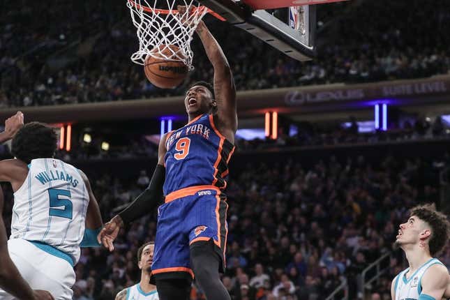 Nov 12, 2023; New York, New York, USA;  New York Knicks guard RJ Barrett (9) dunks in the second quarter against the Charlotte Hornets at Madison Square Garden.