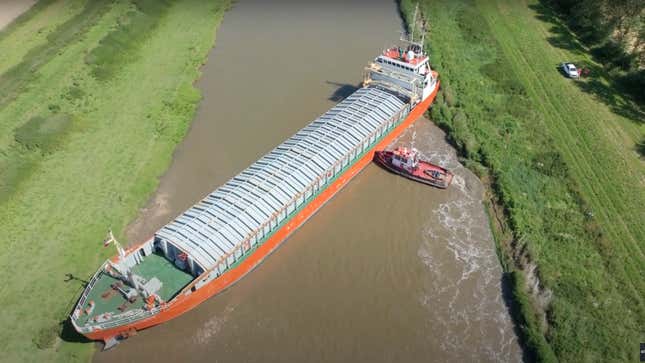 Baltic Arrow stuck in the river Nene in Cambridgeshire