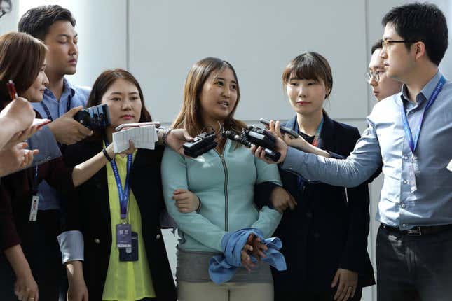 Chung Yoo-ra, daughter of Choi Soon-sil, answered questions from the press after arriving at Incheon International Airport in South Korea in May 2017.
