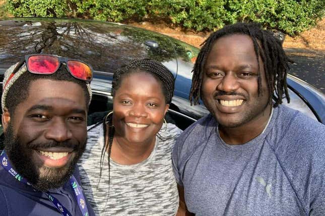 (Right) Irvo Otieno pictured with his family.