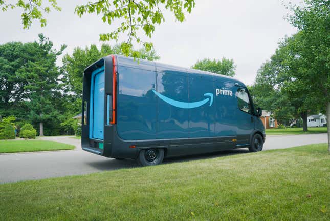 The rear 3/4 view of the Rivian Commercial Van with the Amazon livery