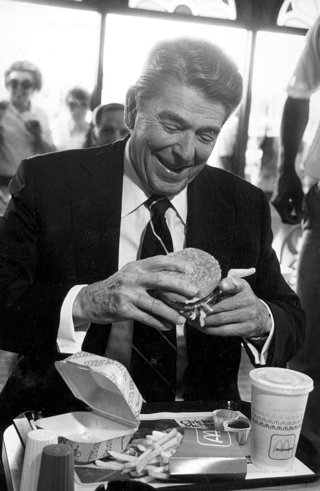 U.S. President Ronald Reagan eats at a McDonald’s restaurant after addressing students at the University of Alabama in Tuscaloosa, Ala., on Oct. 16, 1984.
