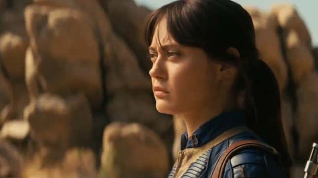 Lucy stares out at a desert.