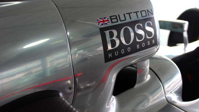 A photo of Jenson Button's name badge on a 2010 McLaren F1 car. 