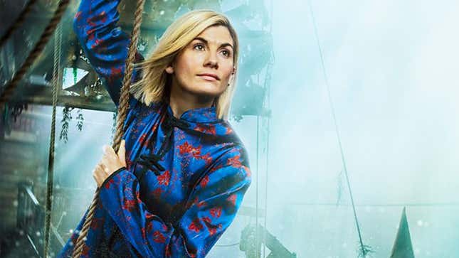 Jodie Whittaker's 13th Doctor looks out as she hangs from a rope dangling from a pirate ship.