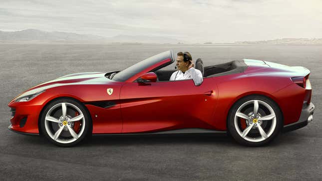 An imagine of Nick Saban sitting in a red 2023 Ferrari Portofino M.