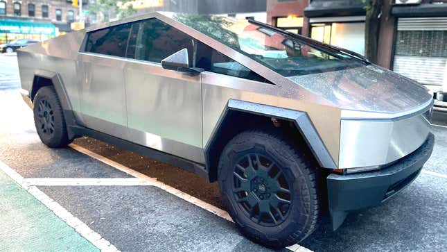 The Tesla Cybertruck parked on a New York City street after a rainstorm