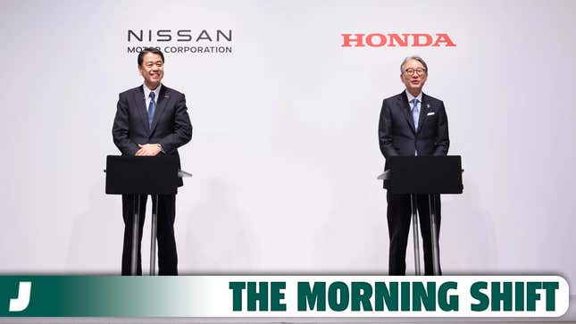 A photo of Honda and Nissan executives on stage. 