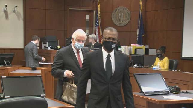 An undated photo of John Fitzgerald Johnson leaving a courtroom in Louisville, Kentucky.