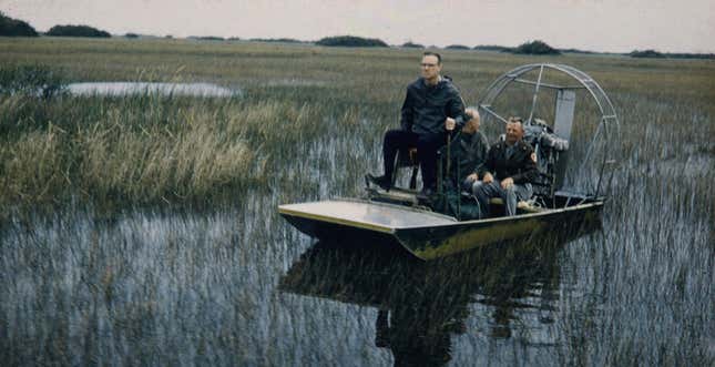National Park Service employees ride a fan boat at Everglades National Park in Florida, U.S., 1958.
