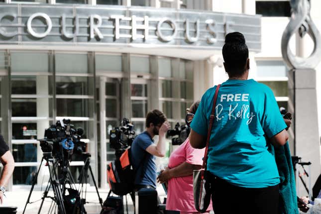 Supporters of R. Kelly gather in front of a Brooklyn courthouse as jury deliberations in the federal trial against the performer continue on September 27, 2021 in New York City. 