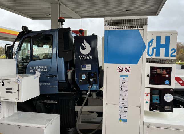 A Mercedes-Benz Unimog filling up at a hydrogen station