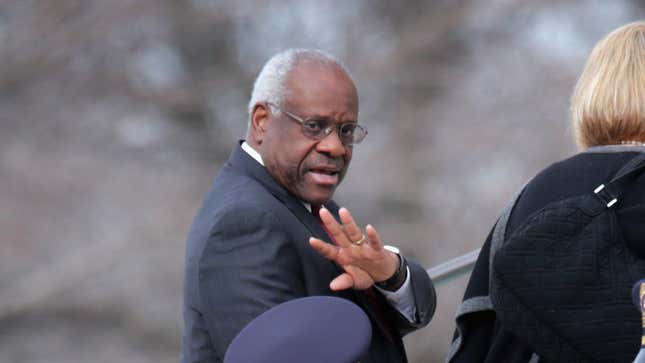 U.S. Supreme Court Associate Justice Clarence Thomas and his wife Virginia Thomas arrive for the funeral for fellow Associate Justice Antonin Scalia at the the Basilica of the National Shrine of the Immaculate Conception February 20, 2016 in Washington, DC.