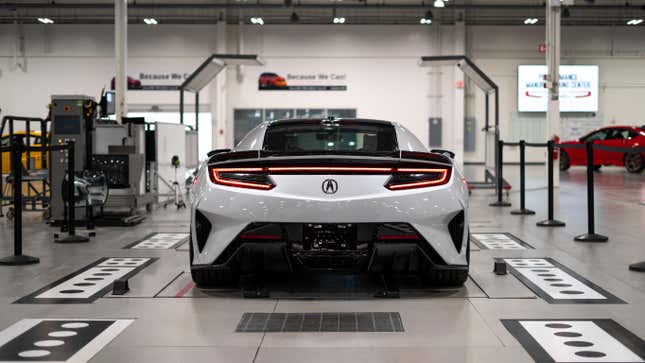 An Acura NSX undergoing final checks at the factory