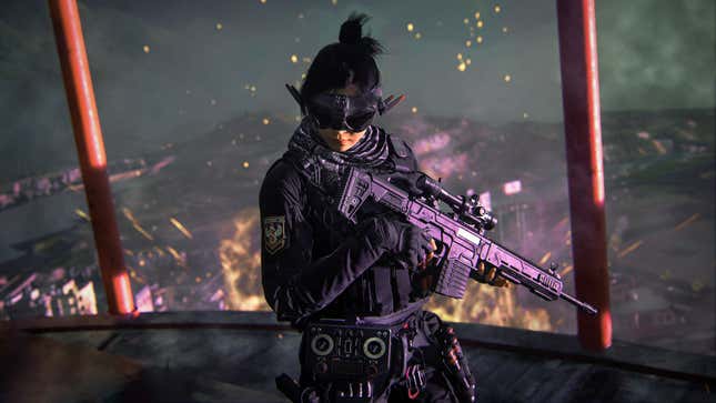A woman wearing goggles and hodling an assault rifle stands in an assault rifle.