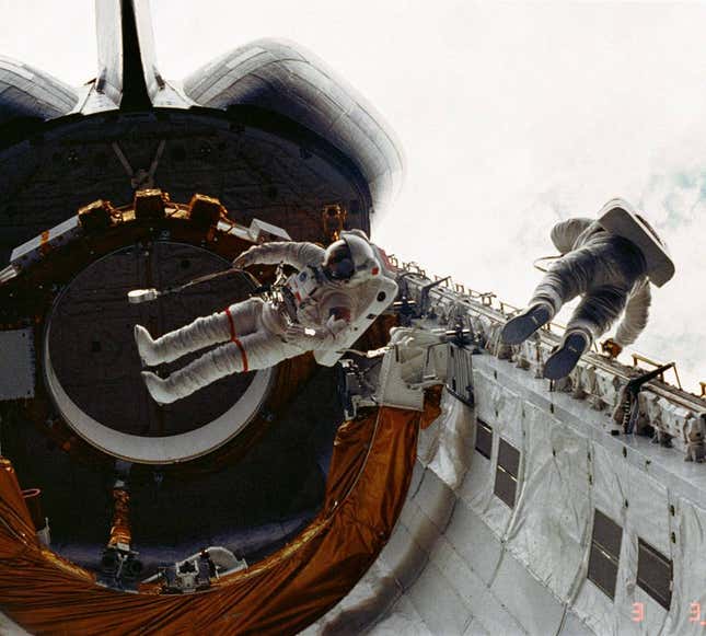STS-6 astronauts F. Story Musgrave (left) and Donald H. Peterson during the first Shuttle
EVA in 1983.
