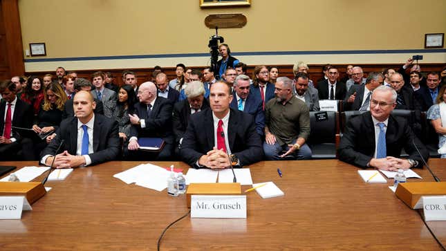 Ryan Graves, executive director of Americans for Safe Aerospace, David Grusch, former National Reconnaissance Office representative on the Defense Department's Unidentified Aerial Phenomena Task Force, and retired Navy Commander David Fravor attend House Oversight & Accountability Committee's National Security, the Border, and Foreign Affairs Subcommittee's hearing on "Unidentified Anomalous Phenomena: Implications on National Security, Public Safety, and Government Transparency" at the U.S. Capitol Hill in Washington, U.S., July 26, 2023