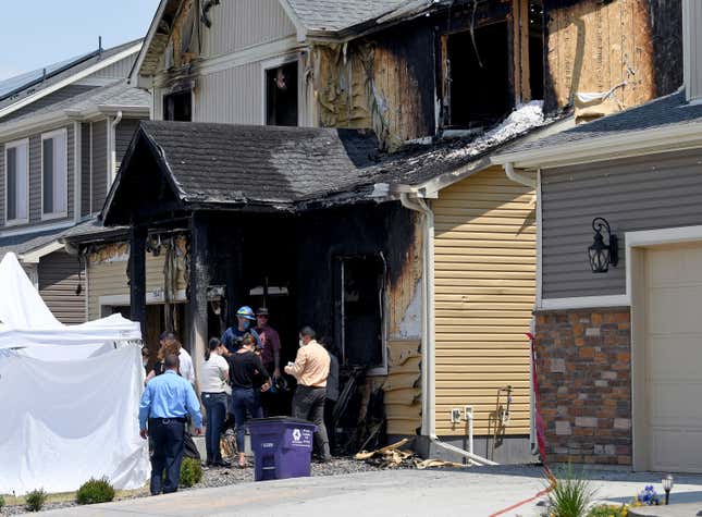 FILE - Investigators stand outside a house where five people, immigrants from the West African nation of Senegal, were found dead after a fire, Aug. 5, 2020, in Denver. Colorado’s highest court on Monday, Oct. 16, 2023, upheld the search of Google users&#39; keyword history to identify suspects in the 2020 fatal arson fire, an approach that critics have called a digital dragnet that threatens to undermine people&#39;s privacy and their constitutional protections against unreasonable searches and seizures. (AP Photo/Thomas Peipert, File)