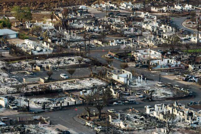 FILE - A general view shows the aftermath of a wildfire in Lahaina, Hawaii, on Aug. 17, 2023. When the town of Lahaina, which was leveled by wildfire in August, is rebuilt, local residents who survived the conflagration might not be able to afford to live there, leading economists warned on Friday, Sept. 22, 2023. (AP Photo/Jae C. Hong, File)