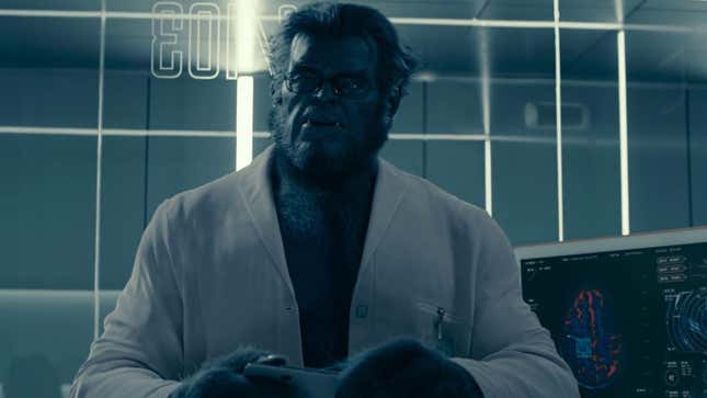 Beast is shown wearing a lab coat and glasses.