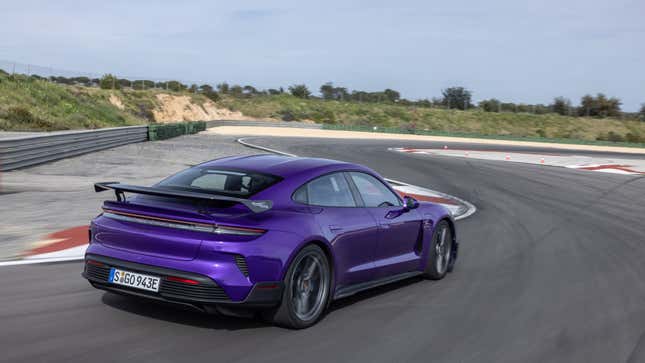Rear 3/4 view of a purple Porsche Taycan Turbo GT