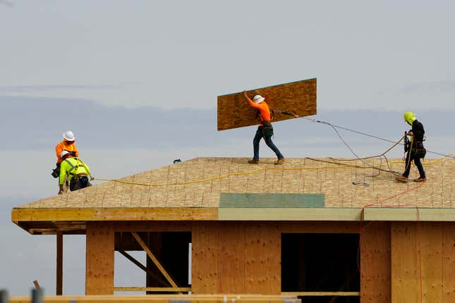 FILE - Work is done on the roof of a building under construction in Sacramento, Calif., on March 3, 2022. New numbers released Friday, March 22, 2024, show California has the highest unemployment rate in the country. Job losses in February were led by a drop in the construction industry. (AP Photo/Rich Pedroncelli, File)