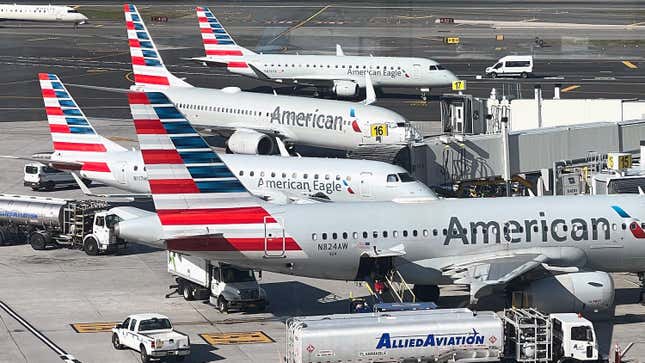 American Airlines jets are parked at their gates at Laguardia Airport on November 10, 2022 in the Queens borough of New York City.