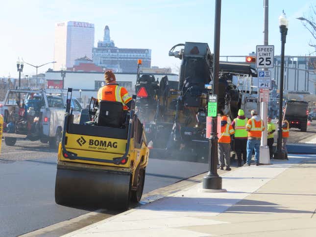 Heavy equipment repaves part of Atlantic Avenue in Atlantic City, N.J. on Dec. 13, 2023 as the city&#39;s controversial &quot;road diet&quot; project to narrow the main roadway from two lanes in each direction to one began. Five casinos and a hospital are asking a judge to order a halt to the plan, saying it could dangerously worsen traffic in the seaside gambling resort. (AP Photo/Wayne Parry)