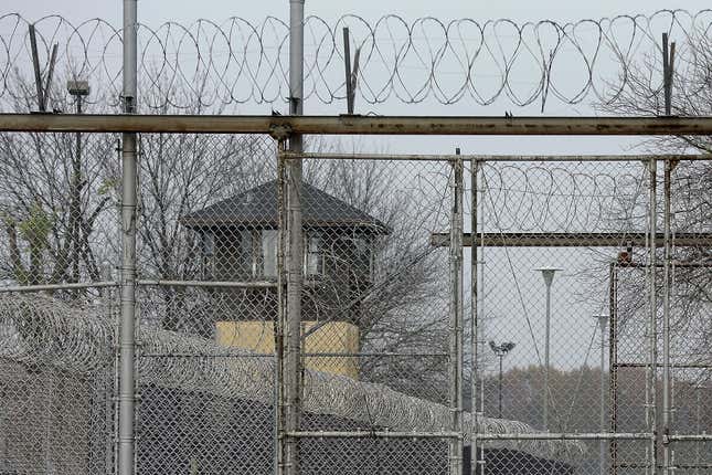 FILE - Security fences surround the Illinois Department of Corrections&#39; Logan Correctional Center, Nov. 18, 2016, in Lincoln, Ill. Illinois Gov. J.B. Pritzker&#39;s administration has retained a contentious choice for providing medical care to prison inmates, awarding Wexford Health Sources a 10-year, $4.16 billion contract despite high vacancy rates, complaints of substandard care and lawmakers&#39; agitation to find a replacement. (AP Photo/Seth Perlman, File)