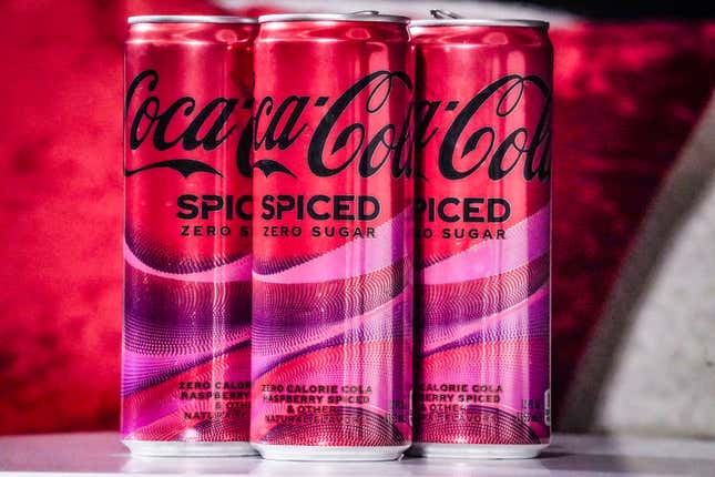 Cans of Coca-Cola Spiced, the beverage company&#39;s first new permanent offering to its North American portfolio in three years, are introduced at a livestream media event, Tuesday, Feb. 6, 2024, in New York. (AP Photo/Bebeto Matthews)