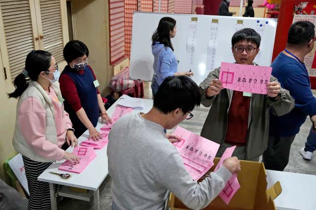 FILE - Polling officers count votes in New Taipei City, Taiwan, Jan. 13, 2024. Voters in Taiwan recently repelled a wave of disinformation seeking to undermine their democracy ahead of this month&#39;s recent election. Experts say Taiwan was able to rebuff China&#39;s efforts to meddle with their democracy by taking the challenge of disinformation seriously. In doing so, the island can offer lessons to the U.S. and other nations holding their own elections amid the threat of foreign disinformation. (AP Photo/Ng Han Guan)