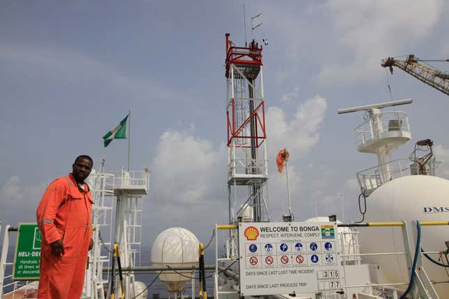 FILE - A member of Shell staff on the Bonga offshore oil Floating Production Storage and Offloading vessel off the coast of the Niger Delta in Nigeria, on Dec. 26, 2011. Local activists and international environmental groups want Nigeria&#39;s government to delay approving the sale of oil company Shell&#39;s onshore assets, claiming Shell is trying to shirk its environmental and social responsibilities in the highly polluted Niger Delta. The Centre for Research on Multinational Corporations (SOMO), a Dutch non-profit, released a report Wednesday Feb. 28, 2024 saying Shell shouldn’t be allowed to divest in the delta unless it takes “responsibility for its toxic legacy of pollution and ensures the safe decommissioning of abandoned oil infrastructure.” (AP Photo/Sunday Alamba, File)