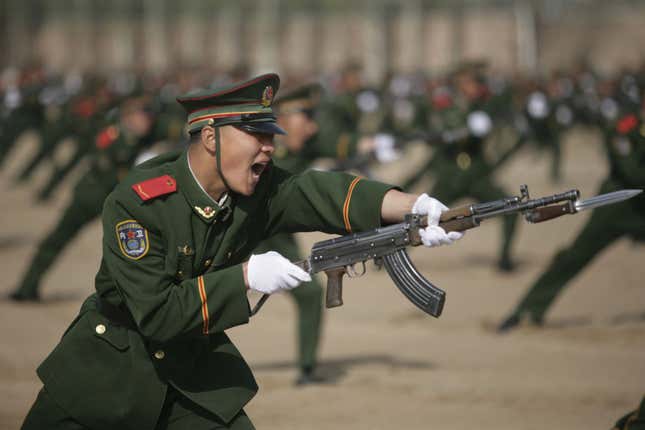 Paramilitary policemen take part in a drill at a military base in Yinchuan, China on Apr. 16, 2009.