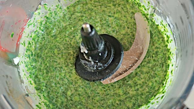 Spinach mixture in a food processor. 