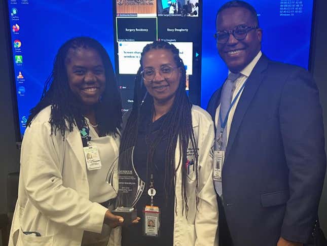 Dr. Samantha Woolery (center) was awarded the 2023 Morehouse Intern of the Year Award in June.