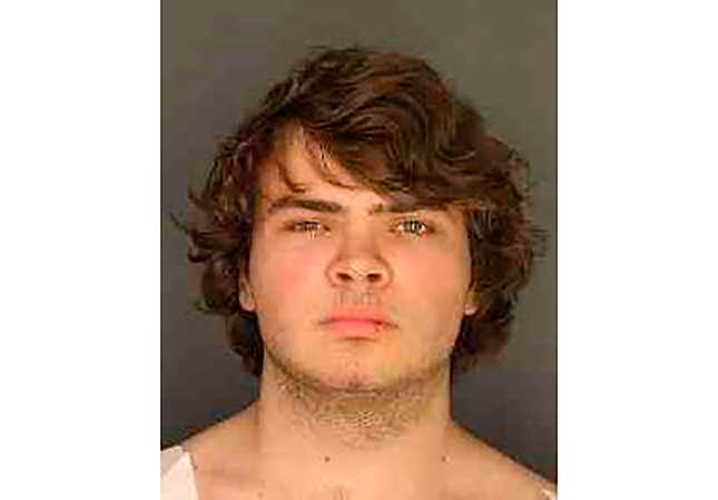 This image provided by the Erie County District Attorney’s Office shows Payton Gendron. Authorities say the white 18-year-old who killed 10 people at a Buffalo supermarket during a rampage that targeted Black people had previously made a threat at his high school. But they say Gendron was never charged with a crime and had no further contact with law enforcement after his release from a hospital.