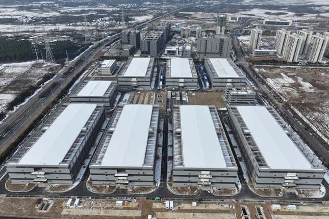 aerial view of data center buildings in a row