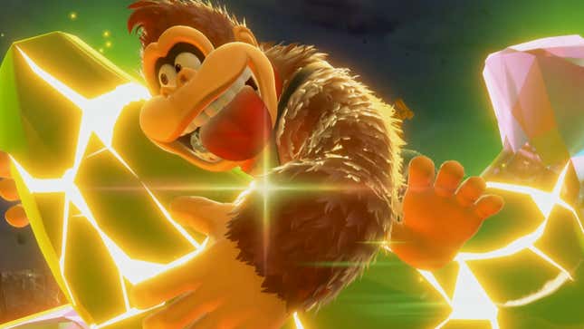 DK hugs a gold banana. 