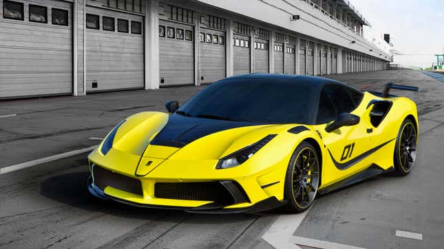 A bright yellow Ferrari with modified body panels 