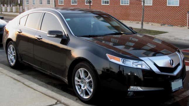 2009 Acura TL in black showing off how big the shield grille is