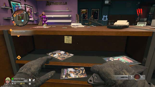 A screenshot showing the location of a sticky note with the vault combination on it. This one is hidden under the central counter in the comic book shop.