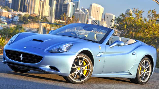 A photo of a pale blue Ferrari California. 