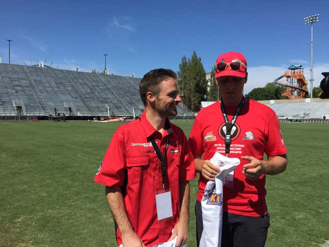 Nowak (left) as he’s told that he won.