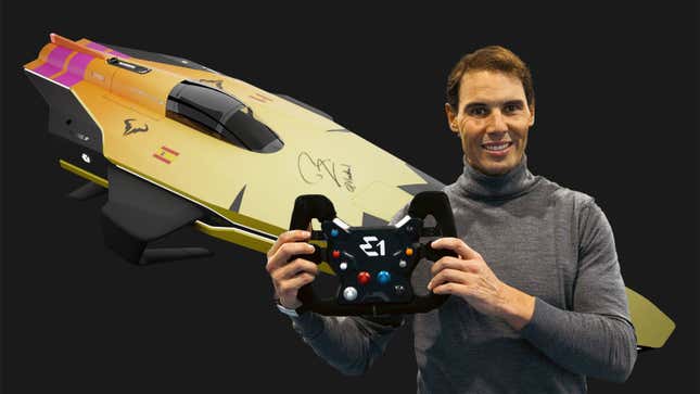 A photo of Rafael Nadal holding the steering wheel of an electric racing boat. 