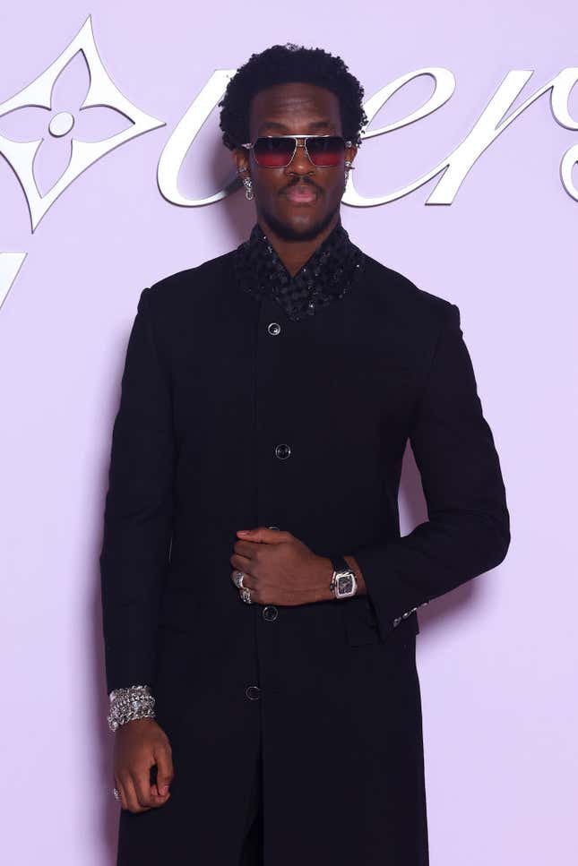 Image for article titled Fly Black Celeb Looks at the Louis Vuitton Show at Paris Fashion Week