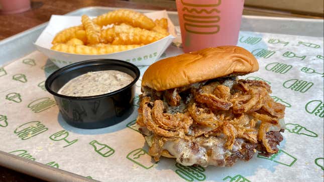 Shake Shack Black Truffle Burger and fries on tray