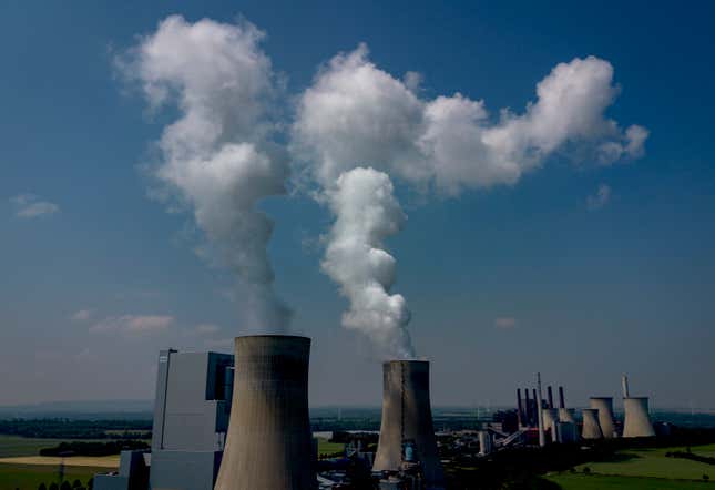 FILE - Steam rises from the coal-fired power plant in Neurath, Germany, on June 8, 2023. Carbon dioxide emissions in Germany, Europe&#39;s biggest economy, dropped to their lowest level in seven decades last year as the use of coal declined unexpectedly sharply and economic pressures weighed down industrial production, according to a study released Thursday Jan. 4, 2024. (AP Photo/Michael Probst, File)