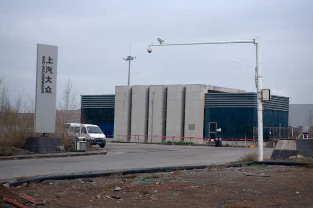 FILE - An SAIC Volkswagen plant is seen in the outskirts of Urumqi in northwestern China&#39;s Xinjiang Uyghur Autonomous Region, Thursday, April 22, 2021. A new report says automakers including Tesla, General Motors, Volkswagen and Toyota are failing to ensure they are not using forced labor as part of their China supply chains. (AP Photo/Mark Schiefelbein, File)