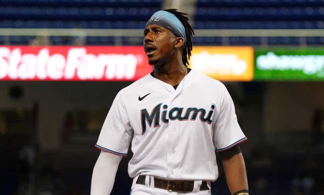 Lewis Brinson of the Miami Marlins shouts to the crowd after hitting a double for two rbi’s in the eighth inning against the New York Mets at loanDepot park on August 05, 2021 in Miami, Florida. 