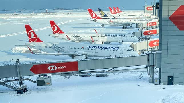 Planes waiting at Istanbul Airport gates after heavy snow